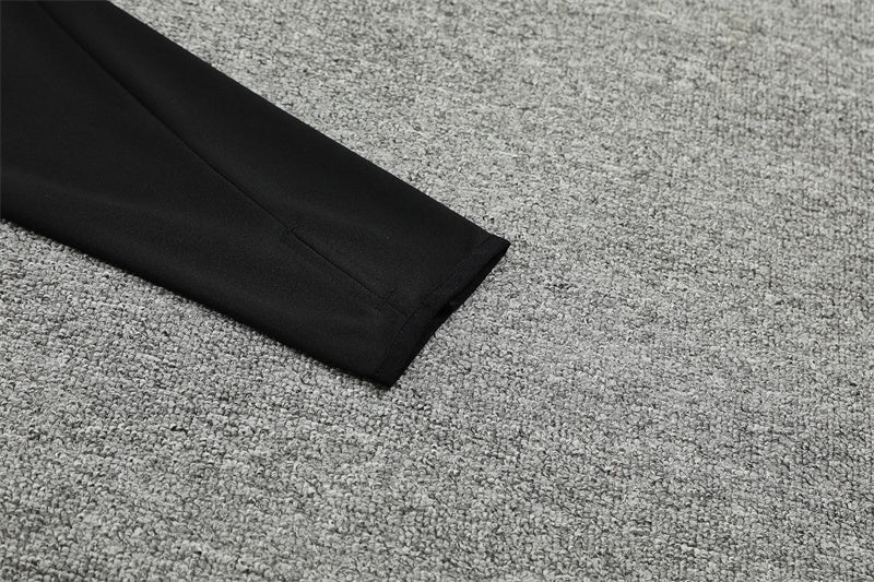 Survet Real Madrid Noir & Mauve 24/25